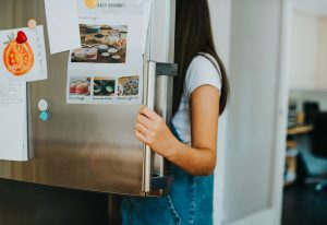 Girl Picking Something Eat Out Fridge